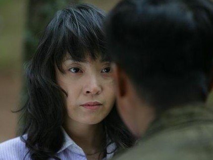 《我的团长我的团》中迷龙是怎么死的,他老婆的真实身份是什么?